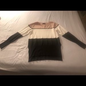 Cute sweater, with small slit at the sides